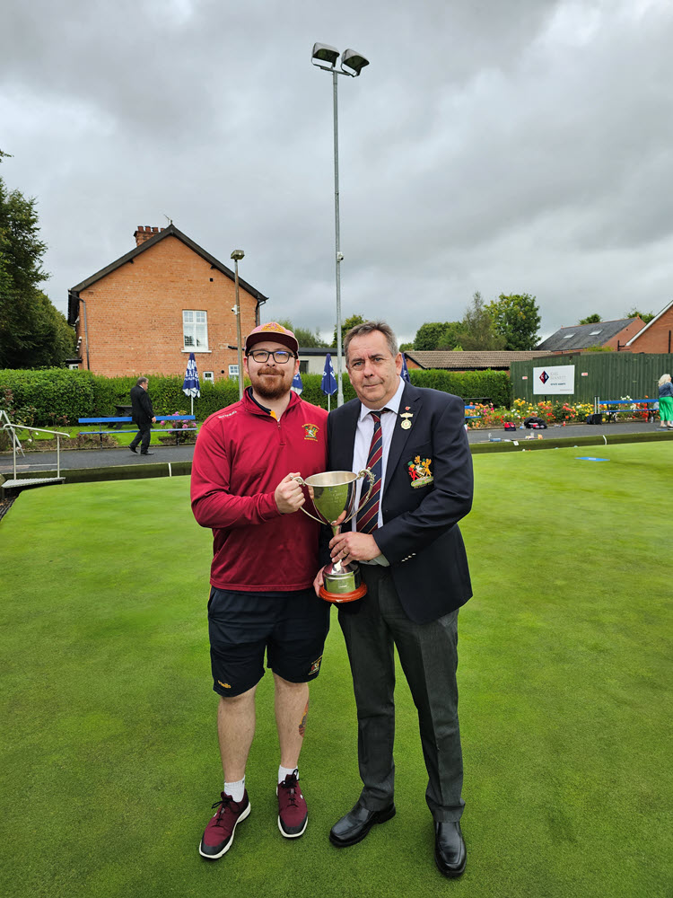 IBA Intermediate Cup Final 2023   Davy McCartney holding the trophy tight with Simon McCartney